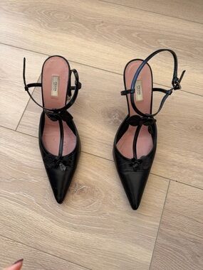 Prada Black Pointed T-Strap Heels with Floral Trim